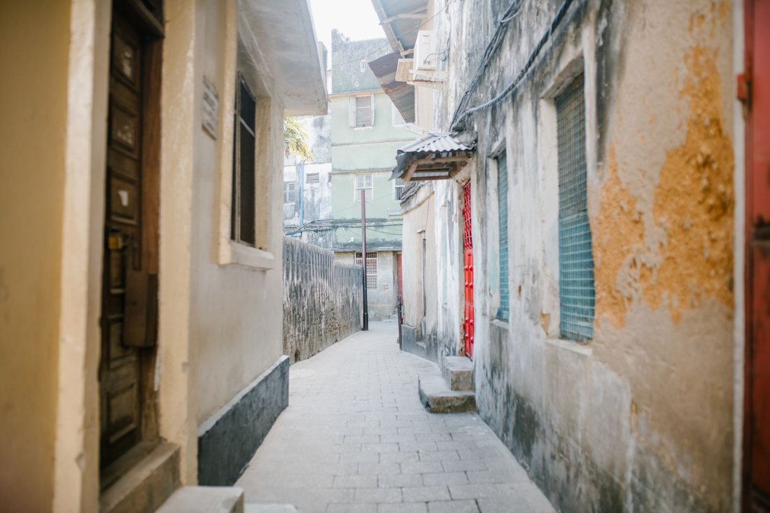 Carved-door alley in historic Stone Town, Zanzibar